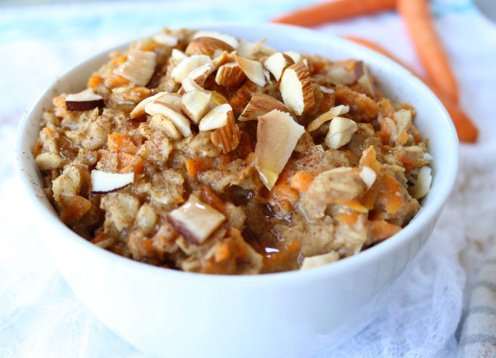 Healthy and easy carrot cake oatmeal breakfast recipe. This delicious oatmeal is vegan, gluten free, and sweetened with only maple syrup. Overnight oats and microwave options provided.