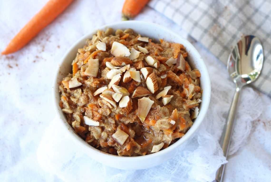 Healthy and easy carrot cake oatmeal breakfast recipe. This delicious oatmeal is vegan, gluten free, and sweetened with only maple syrup. Overnight oats and microwave options provided.