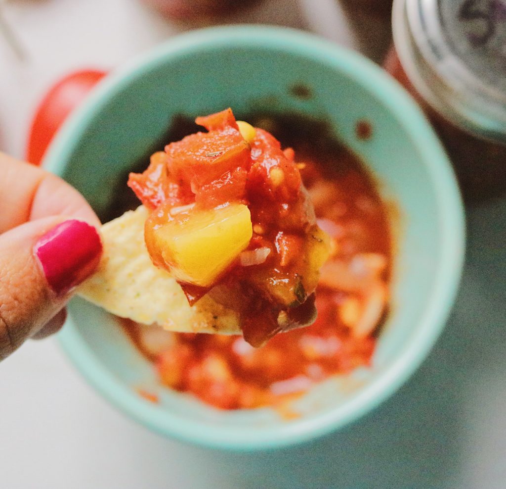 Easy homemade salsa made from fresh tomatoes, corn and herbs.