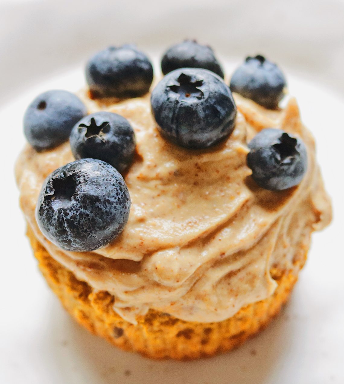 These carrot cake muffins are healthy, gluten-free and vegan! The recipe uses oat flour but there is also an option to make them low carb and keto-friendly.